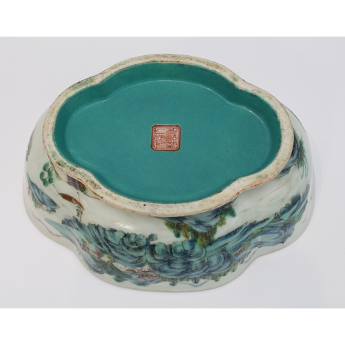 34 - A 20th century Chinese porcelain bowl of quatrefoil form: matt duck-egg blue glazed interior; the ex... 