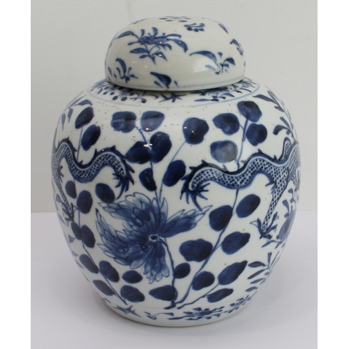 35 - A Chinese blue-and-white ginger jar and cover decorated with dragons between foliage and painted fou... 