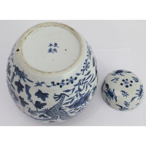 35 - A Chinese blue-and-white ginger jar and cover decorated with dragons between foliage and painted fou... 