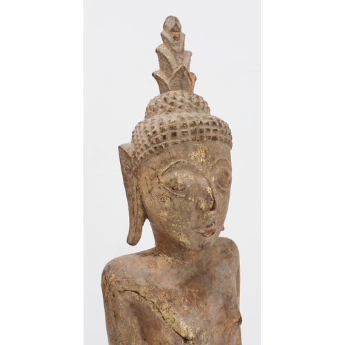 43 - A giltwood figure of Buddha: Laos / Lanna, probably early 20th century, the standing figure with lon... 