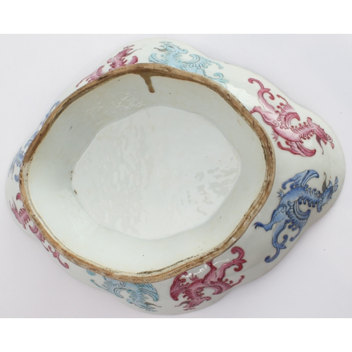 44 - A 19th century Chinese lozenge-shaped porcelain pedestal dish. The interior delicately decorated in ... 