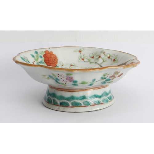 52 - Three Chinese porcelain pieces:
 1. a flowerhead-shaped porcelain pedestal dish decorated with two e... 