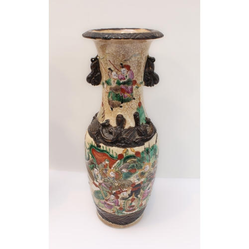 58 - A pair of late 19th to early 20th century Chinese crackleware vases: the slightly waisted neck decor... 