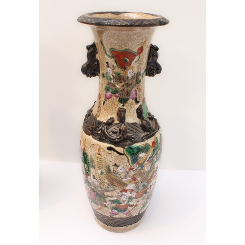 58 - A pair of late 19th to early 20th century Chinese crackleware vases: the slightly waisted neck decor... 