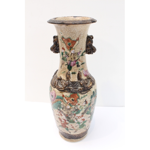 58 - A pair of late 19th to early 20th century Chinese crackleware vases: the slightly waisted neck decor... 