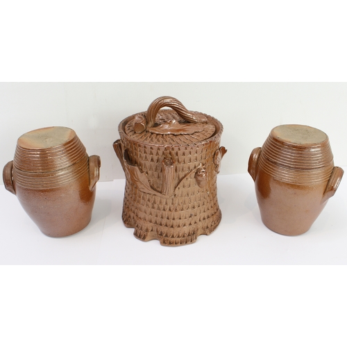 7 - A group of seven:
 1. a pair of 19th century salt-glaze stoneware pots and covers modelled as two-ha... 