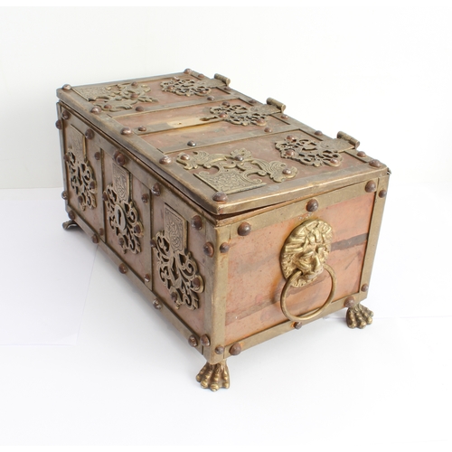 A brass mounted copper tabletop Armada chest in 17th century