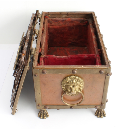 79 - A brass-mounted copper tabletop Armada chest in 17th century German style and of typical strongbox f... 