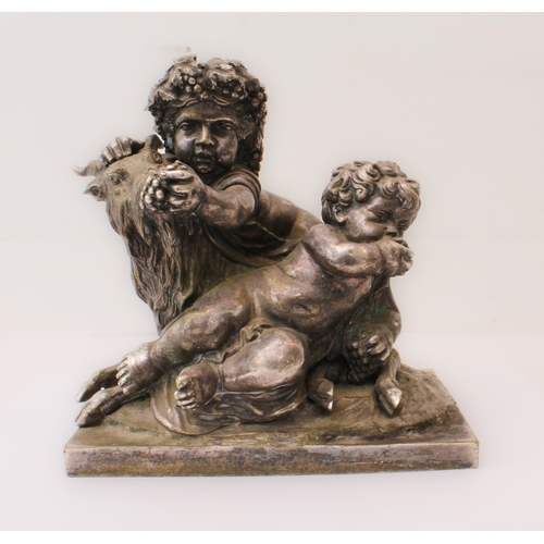 84 - A silvered bronze Bacchanalian figural group: 20th century, depicting two Bacchanalian putti with a ... 