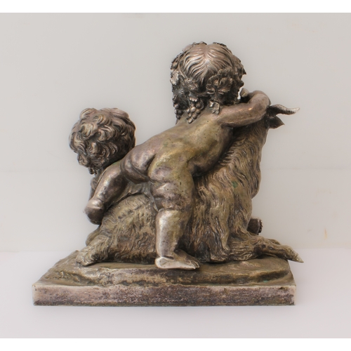 84 - A silvered bronze Bacchanalian figural group: 20th century, depicting two Bacchanalian putti with a ... 