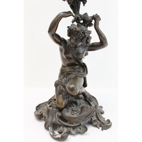 96 - A large and heavy pair of 19th century patinated bronze four-light candelabra: in High Rococo style;... 