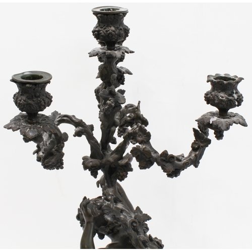 96 - A large and heavy pair of 19th century patinated bronze four-light candelabra: in High Rococo style;... 