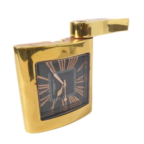 A Dunhill novelty gold-plated travel clock in the form of a