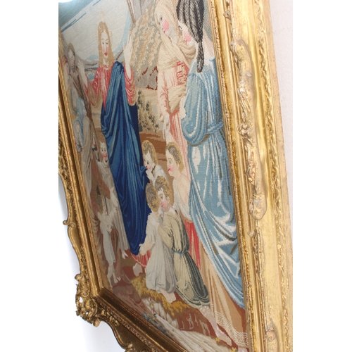 615 - A modern gros point picture with Christ blessing the little children
 Framed and glazed 34 x 23 in (... 
