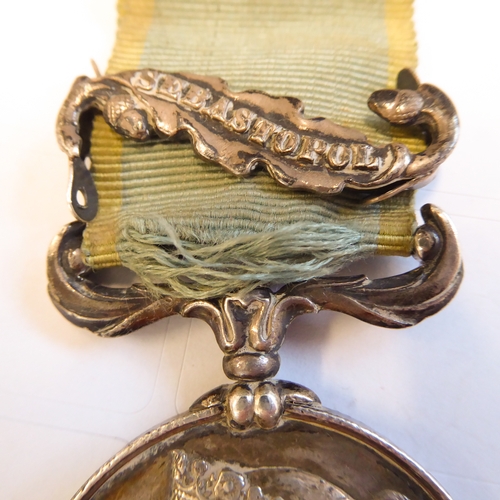 660 - An unnamed Crimea Medal with Sebastopol clasp