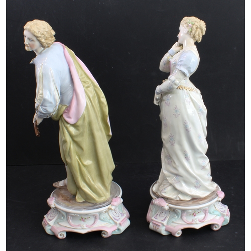 17 - A large pair of 19th century hand-decorated German porcelain figures: male and female in early-style... 