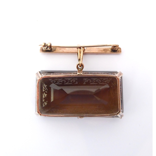 210 - A vintage 9ct rose gold and smoky quartz pendant brooch - the large, 40 x 21 mm emerald cut quartz i... 