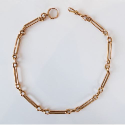 291 - A 15ct rose gold Albert or fob chain - the chain with alternate paperclip and trios of cable links, ... 