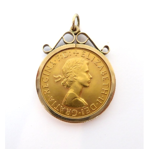 666 - A 1968 Elizabeth II gold sovereign - in a 9ct gold pendant mount, total weight 9.4g.