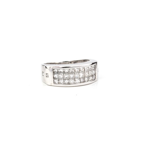 239 - An 18ct white gold and diamond three row ring - unmarked, tests as 18ct, channel set with three rows... 