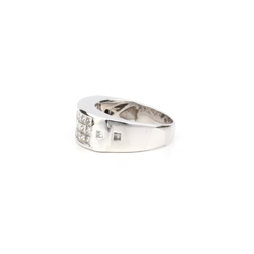 239 - An 18ct white gold and diamond three row ring - unmarked, tests as 18ct, channel set with three rows... 