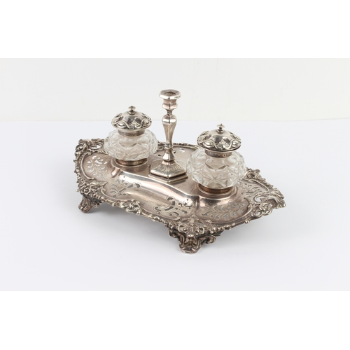 147 - A mid 19th century hallmarked silver pierced boat-shaped desk stand: two silver-mounted and cut-glas... 