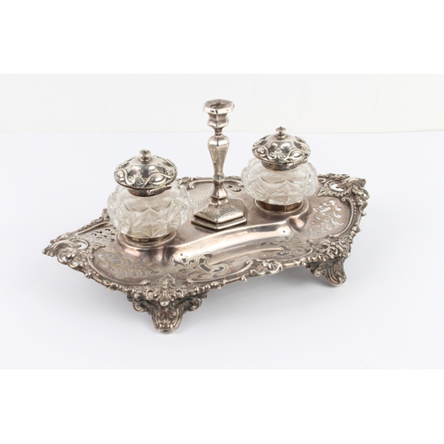 147 - A mid 19th century hallmarked silver pierced boat-shaped desk stand: two silver-mounted and cut-glas... 