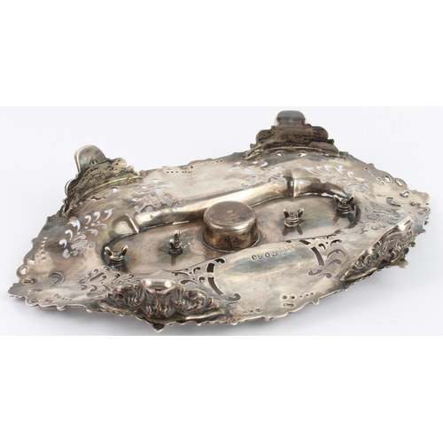 147 - A mid 19th century hallmarked silver pierced boat-shaped desk stand: two silver-mounted and cut-glas... 