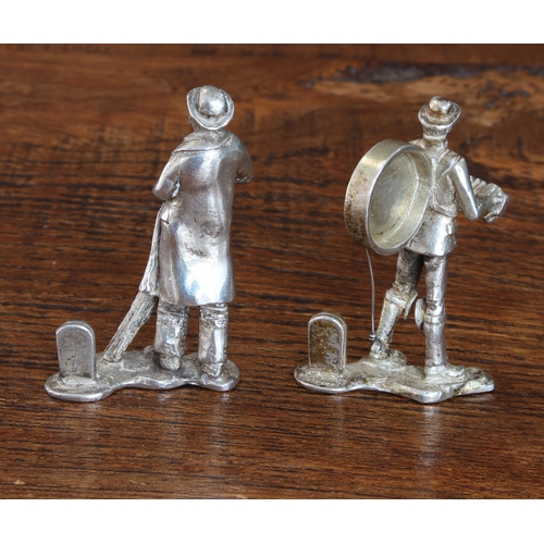 148 - An unusual pair of hallmarked silver figural menu holders/place settings modelled as a Quaker style ... 