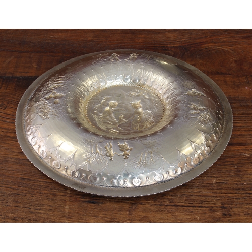 170 - A 19th century heavy hallmarked silver rosewater dish: the central raised circle decorated repoussé ... 