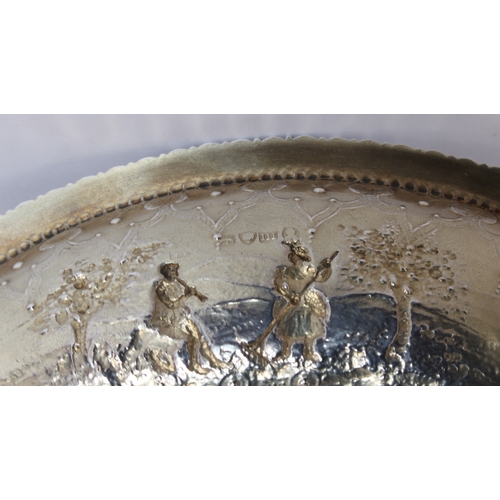 170 - A 19th century heavy hallmarked silver rosewater dish: the central raised circle decorated repoussé ... 