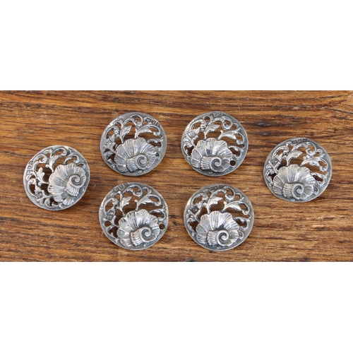 171 - A set of six early 20th century hallmarked silver buttons: each with pierced scrolling foliate decor... 