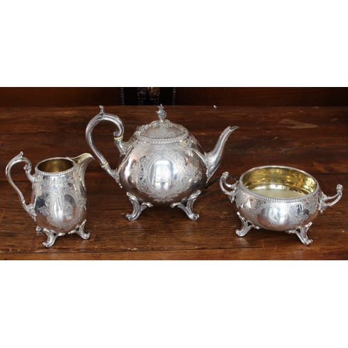 196 - A large and heavy three-piece hallmarked silver tea service comprising teapot, two-handled sugar and... 