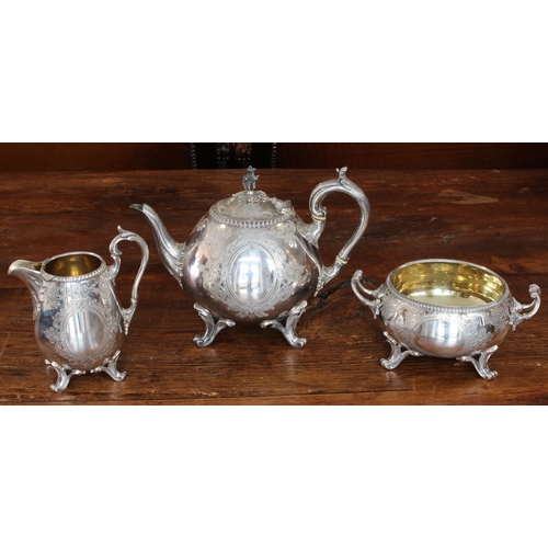 196 - A large and heavy three-piece hallmarked silver tea service comprising teapot, two-handled sugar and... 