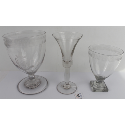 26 - Three rummers and a wine glass:
 1. a late-Georgian etched and cut glass oversized rummer, ovoid bow... 