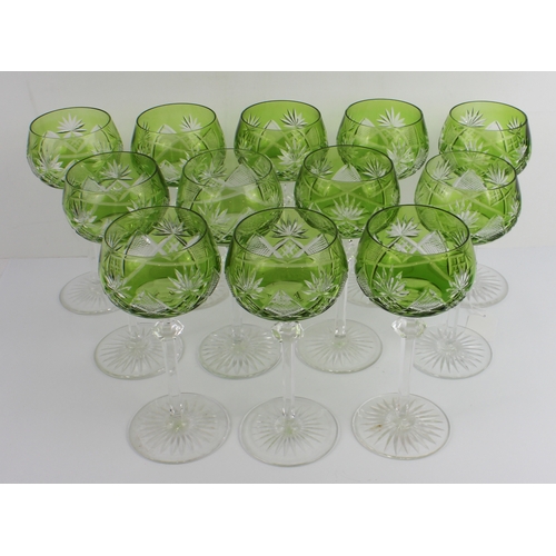 33 - A set of twelve Val St. Lambert 'Berncastel' cut-glass hocks: light-green glass bowls, hexagonal cut... 