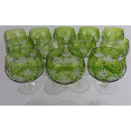 33 - A set of twelve Val St. Lambert 'Berncastel' cut-glass hocks: light-green glass bowls, hexagonal cut... 