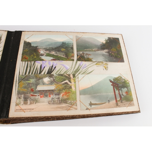 68 - A Japanese lacquer postcard album - 1920s-30s, the black lacquer cover decorated with a handpainted ... 