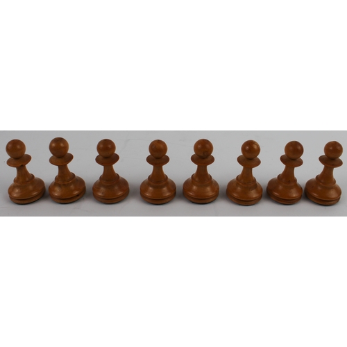 107 - A late 19th to early 20th century boxwood and ebonised chess set within an early 20th century cigar ... 