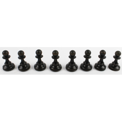 107 - A late 19th to early 20th century boxwood and ebonised chess set within an early 20th century cigar ... 