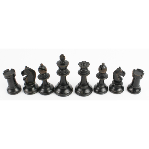 107 - A late 19th to early 20th century boxwood and ebonised chess set within an early 20th century cigar ... 