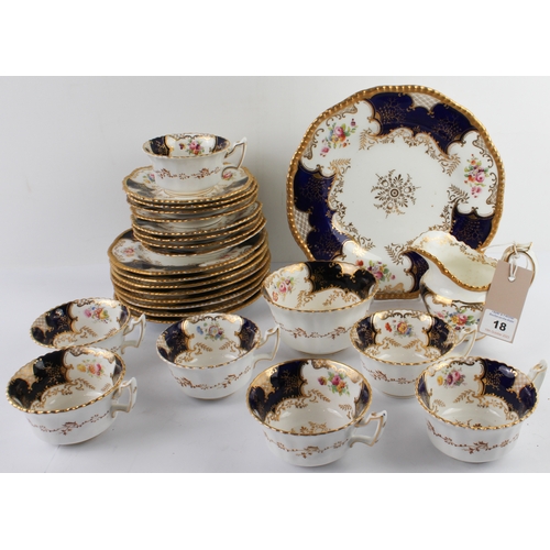 18 - An early 20th century Coalport porcelain tea service. Each piece hand-gilded and decorated with flor... 