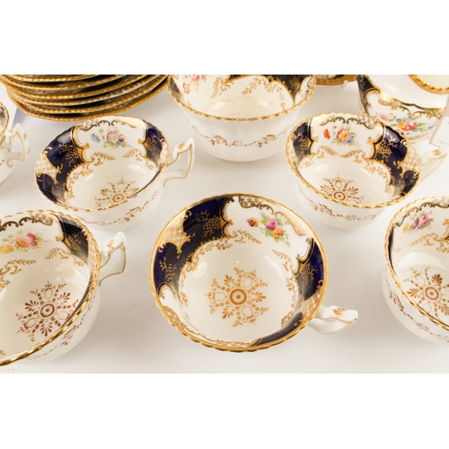 18 - An early 20th century Coalport porcelain tea service. Each piece hand-gilded and decorated with flor... 