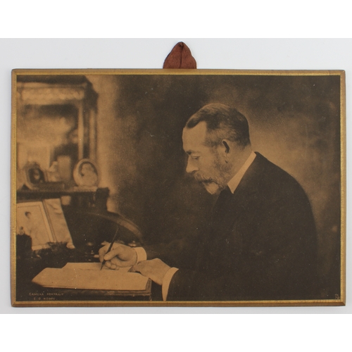 138 - A group of five collectables: 
 1. a photographic print of George V by Raphael Tuck & Sons. Ltd;
 2.... 