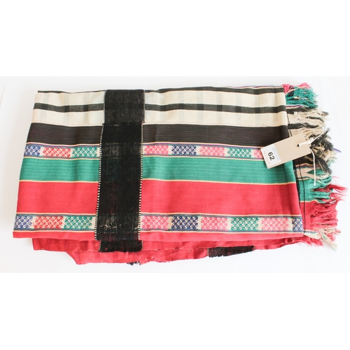 62 - A Burmese tribal woven and embroidered sarong - probably Naga or Yoa tribe, decorated with a variety... 