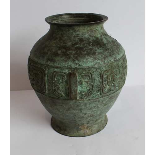 73 - An archaistic-style Chinese bronze Hu, 17th or 18th century, ovoid form and with panels of stylised ... 