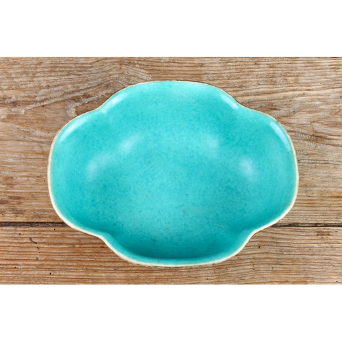 34 - A 20th century Chinese porcelain bowl of quatrefoil form: matt duck-egg blue glazed interior; the ex... 