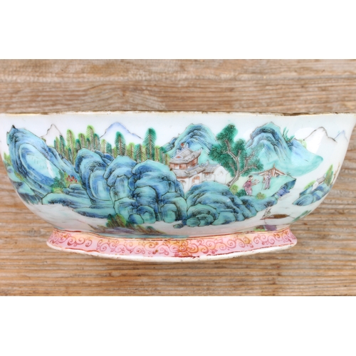 34 - A 20th century Chinese porcelain bowl of quatrefoil form: matt duck-egg blue glazed interior; the ex... 