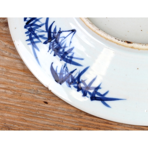 37 - A pair of Chinese blue-and-white porcelain chargers: probably late 19th century, painted with two op... 