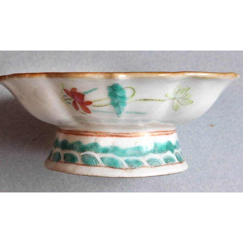 52 - Three Chinese porcelain pieces:
 1. a flowerhead-shaped porcelain pedestal dish decorated with two e... 